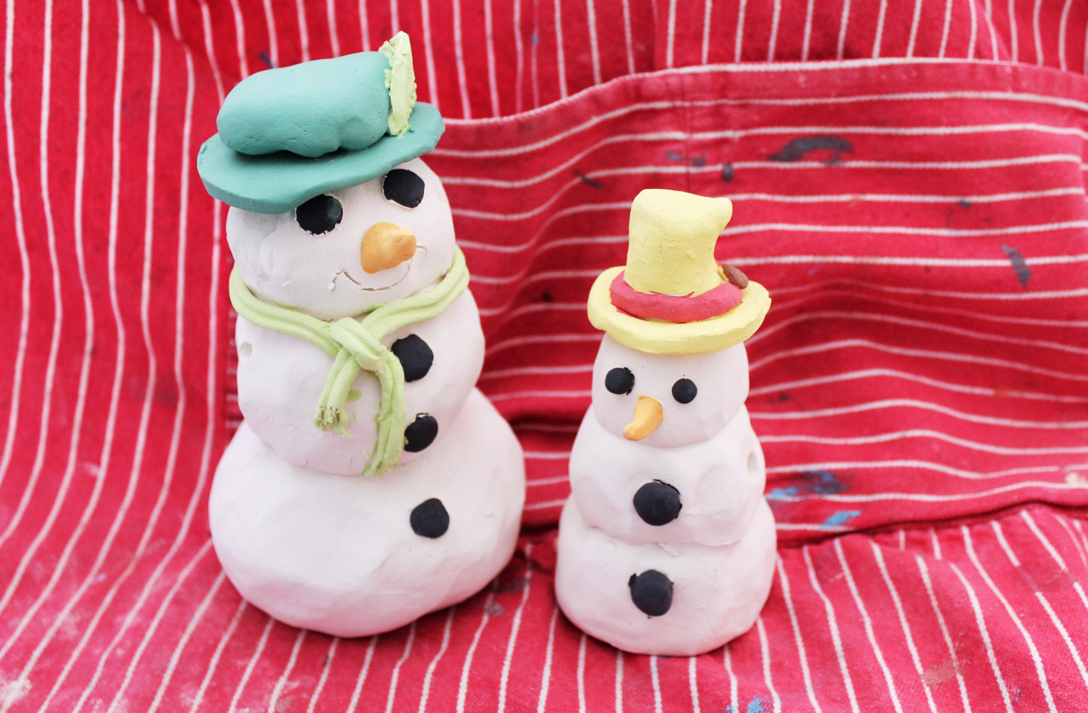 Craft your own charming snowman luminary in our class—perfect for adding a cozy glow to your holiday décor!