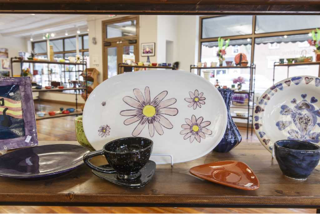 A Plate with a Flower Painted on It