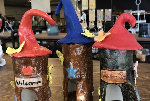 Tree trunk fairy houses